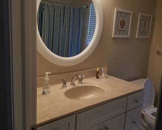 Handsome bath vanity; vanity mirror; vanity light