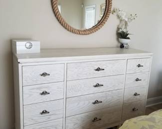 12-drawer dresser by Stanley Furniture; rope trimmed mirror