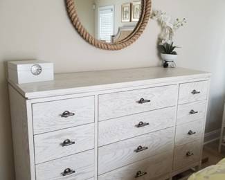 12-drawer dresser by Stanley Furniture; rope trimmed mirror
