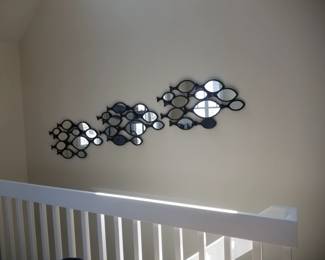 Three schools of fish mirrors