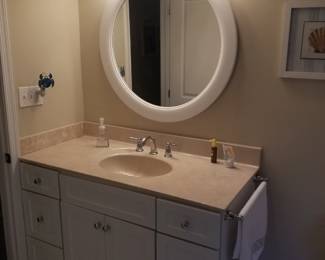 Handsome bath vanity; vanity mirror; vanity light