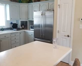 Attractive kitchen with extensive upper & lower cabinetry; stainless steel JennAir appliance suite