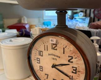 Reproduction clocks and restaurant sign