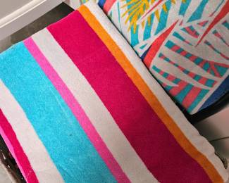 lots of colorful beach towels