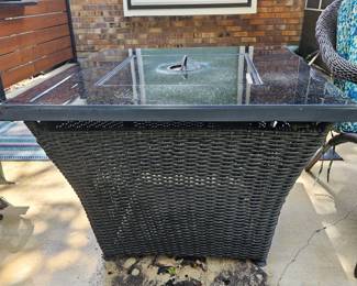 table to wicker chairs
