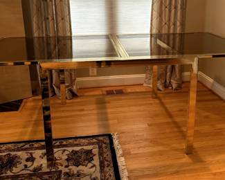 1970s brass and smoked expandable glass dining table