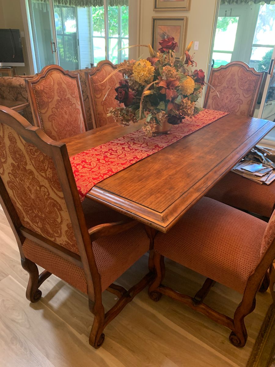 Wood and wrought iron dining table with chairs