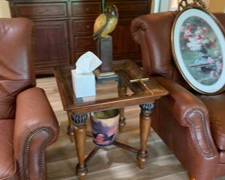 Matching side tables and cool parrot lamps