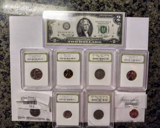 Uncirculated coins and $2 bill