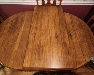 Dining room table with extra leaf 