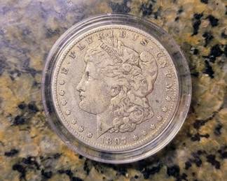 1897 Morgan silver dollar