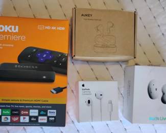 EM156Roku Premiere And Apple Earbuds