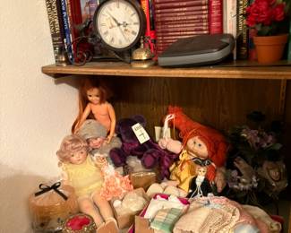 dolls,  books, clock