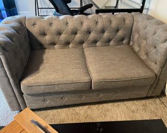 Chesterfield-style loveseat