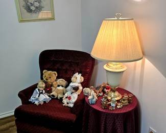 Upholstered chair, porcelain dolls and teddy bears
