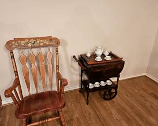 Vintage rocking chair. Wood tea service cart.