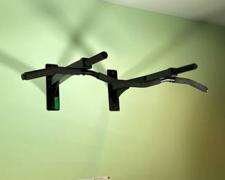 WALL MOUNTED PULL-UP BAR | With reinforced beams and three-position grips. Bolts directly to standard 16-inch spaced wall studs - w. 41 x d. 25 in