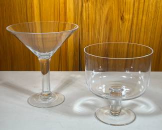 (2pc) Glass Compotes | Deep, round elevated bowl and large champagne glass shape display dish looks to be handblown. - h. 10 x dia. 9 in (Champagne)