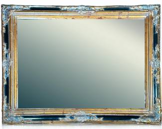 Beveled Glass Fancy Framed Mirror | In a gilt carved and ebonized style frame - h. 39.5 x w. 49.5 in (overall)