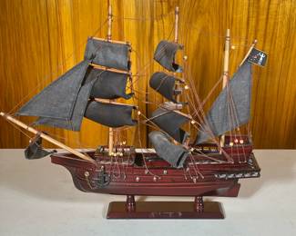 Wooden John Halsey's Charles Pirate Ship Model | Having handcrafted wooden hull and masts and 11 hand-sewn black cloth sails - h. 15.25 x l. 18.5 x d. 3.5 in
