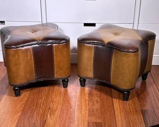 (2pc) Pair TIC Collection Morocco Ottomans | Contrasting brown leather. Having nail head detailing, matching covered button, on four wooden legs - h. 15.5 x w. 18 x d. 18 in (each)