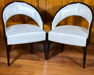 (2pc) Pair White Leather Contemporary Chairs By Selva Of Italy | The ‘Peggy Chair” is designed by Peggy Morris and has a veneer finish of cherry wood. 100% leather fabric. - h. 32 x w. 23 x d. 21 in