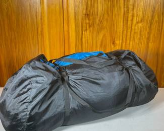Outdoor Sleeping Bag | Zippered down filled designed to fold into black carrying case. - h. 16 x w. 16 x l. 30 in