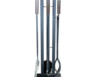 Contemporary Fireplace Tool Set | Stand with four tools of black metal finish with brown handles
Dimensions: h. 30.75 x w. 6 x l. 9.75 in (stand)