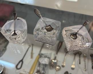 Salt Cellars with sterling spoons.