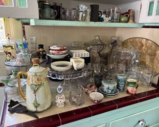 You will find loads of vintage kitchen items including cake plates, teapots, pressed glass and more