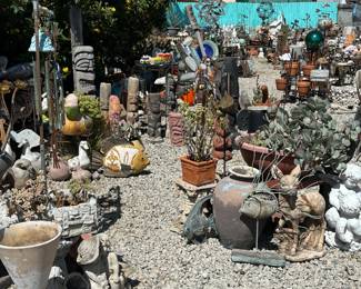 Notice the mid-century/modern cone shaped architectural planter on the left side of this image
