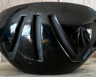 Carved black on black Santa Clara Pueblo pot by Stella Chavarria