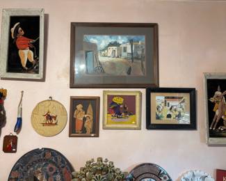 The Mexican pottery rooms walls are lined with Mexican art works