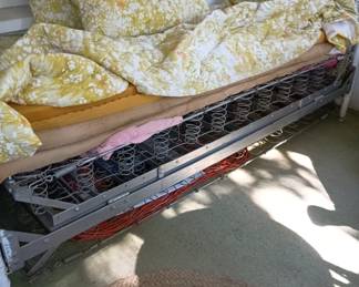 The frame folds out to what looks like a Full size bed