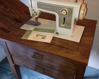 Sewing machine in the table