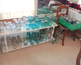The same canning jars
Clear and blue with bail and glass lids