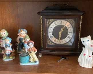 Clock And Figurines