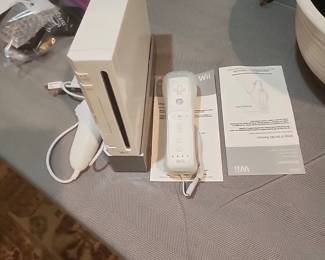 Wii console and 2 controllers
Games sold separately: Wii play, major league baseball, personal trainer, active, fit