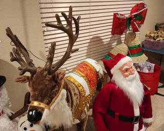 Large reindeer and santa