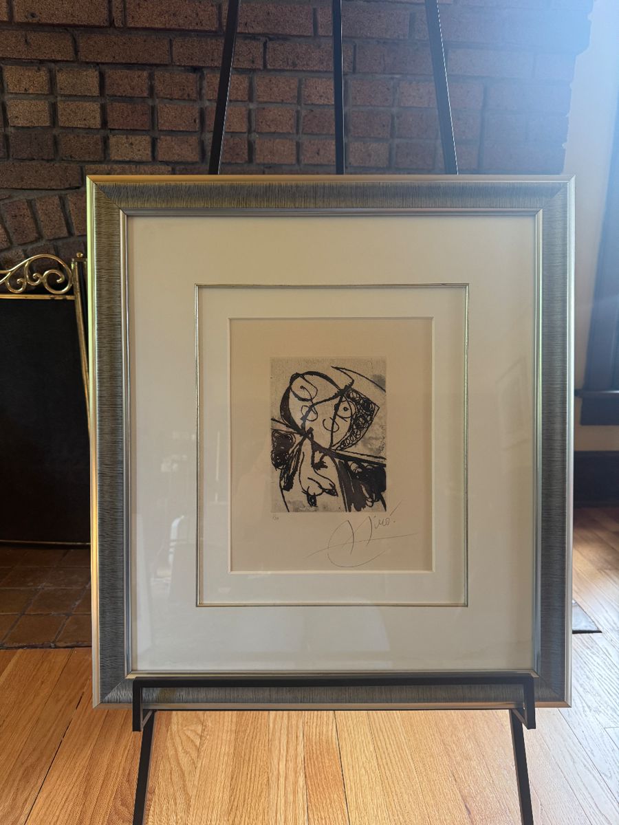 Photo 1 of 2 - Framed, signed, and numbered figural etching by the renowned Spanish artist Joan Miró (1893-1983)
