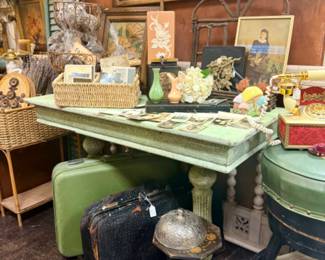 Old suitcases, framed art, sconces and more.