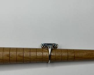 J3 - $500. Size 5.5. 14kt gold. (Aquamarine or Blue Topaz Stone.) Missing one small diamond.