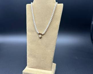 J37 - $1,500. Mikimoto Pearls. Authenticated. 17.5" long necklace. 18kt gold clasp and pendant. Pearls are 4-4.5mm. 