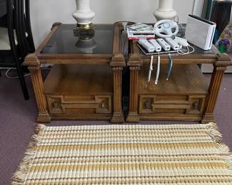 W89 - $35 Pair. Vintage glass top end tables. Measures 24.5" wide x 31" deep x 20" tall.