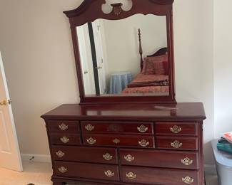 W15 - $175. Wooden Dresser with Mirror. Measures 64" wide x 18" deep x 32" tall. Mirror is 44" wide x 47" tall. All drawers slide easily. 7 Drawers total. (3 on the top are double deep)