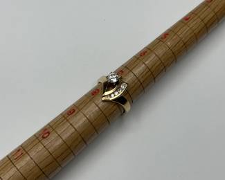 J1 - $300. Size 8. 14kt & diamond ring.