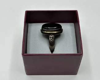 J30 - $25. Size 9 Sterling Ring with Large Black Stone.