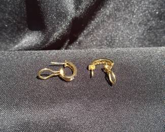 J36 - $1,750. Tiffany & Co. 750. 18kt gold, Diamond & Sapphire Huggie earrings with Omega back. When on has a .75" drop. In excellent condition!