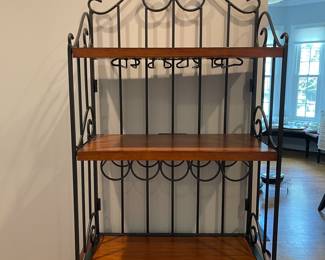 W130 - $100. Bakers Rack with storage for wine bottles & glasses. Measures 29" wide x 17" deep x 72" tall.