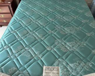 W16 - Queen Size 4 Poster Bed. 1 of the posts at the foot is broken - we have the pieces and it can be glued back in. Older - but Clean! Simmons mattress and boxspring.